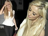 Drowning her sorrows: Chantelle Houghton looks worse for wear as she heads home following a night out with friends