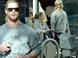 After shopping at upmarket boutique Zadig & Voltaire with his wife and their newborn baby daughter India Rose, Chris Hemsworth was seen pounding the streets in west London.