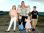 Triple the trouble: Sara Jones holds the latest additions to her brood, Keeva and Ceira. Her first twins were Niamh, far left, and Liam, far right, both ten, and Shay and Aoife (centre), both two, are now two.