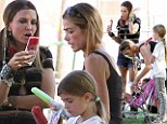 They must have a lot to talk about! Charlie Sheen's ex-wives Brooke Mueller and Denise Richards take their brood to the Pumpkin Patch