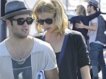 Working relationship: Real life couple Emily Vancamp and Josh Bowman get touchy-feely on the set of Revenge