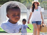 Life's a picnic! Sandra Bullock relishes in a lovely afternoon lunch with her dapper little man Louis 