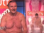 Keeping it brief: Liam Neeson strips down to underpants and gets soaked for charity