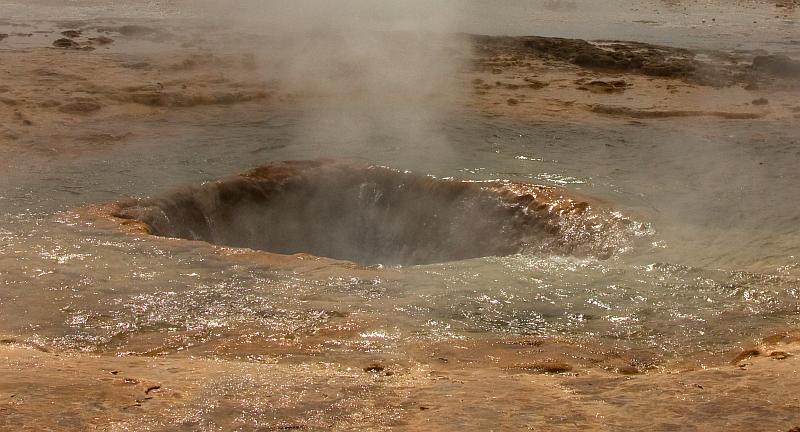 Strokkur leaves a hole after the eruption